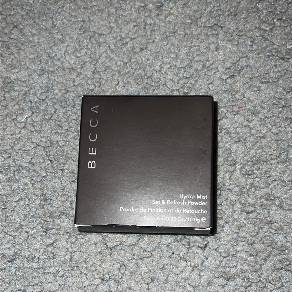 BECCA Hydra-Mist Powder in Black Packaging